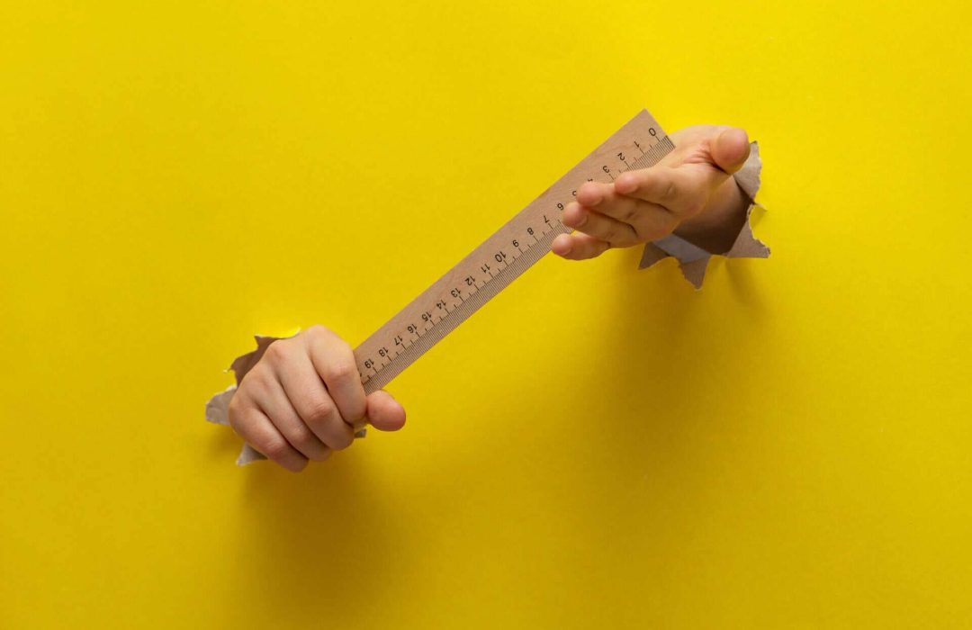 two-children-s-hands-stretched-through-a-torn-shee-2025-03-25-00-15-56-utc-scaled.jpg